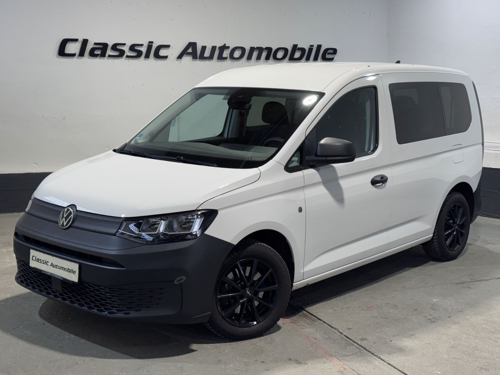 VW Caddy Kombi 2.0 TDI  *7-Sitzer*1.Hand*