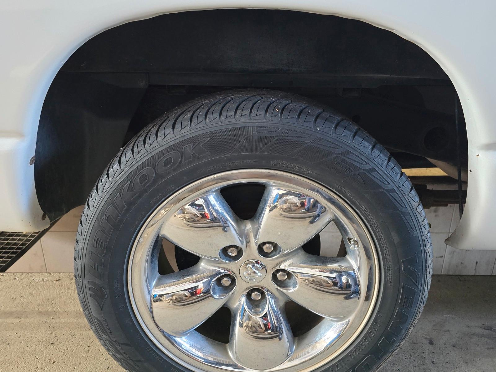Dodge Ram 2004 — photo 12