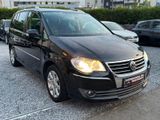 Volkswagen Touran Highline 1.9 *DSG*NAVI*7SITZ*SHZ*AHK* - Volkswagen Touran mit Diesel-Antrieb: Kleinbus, Automatik, 1.9