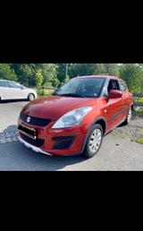 Suzuki Swift 1.2Club4x4 Allrad*1Hand*Klima*SHZ*Tempomat - Suzuki Swift mit Benzin-Antrieb: Orange