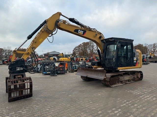 CAT 312 E mit Greifer