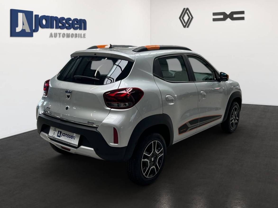 Fahrzeugabbildung Dacia Spring Comfort Plus mit Look-Paket-Orange