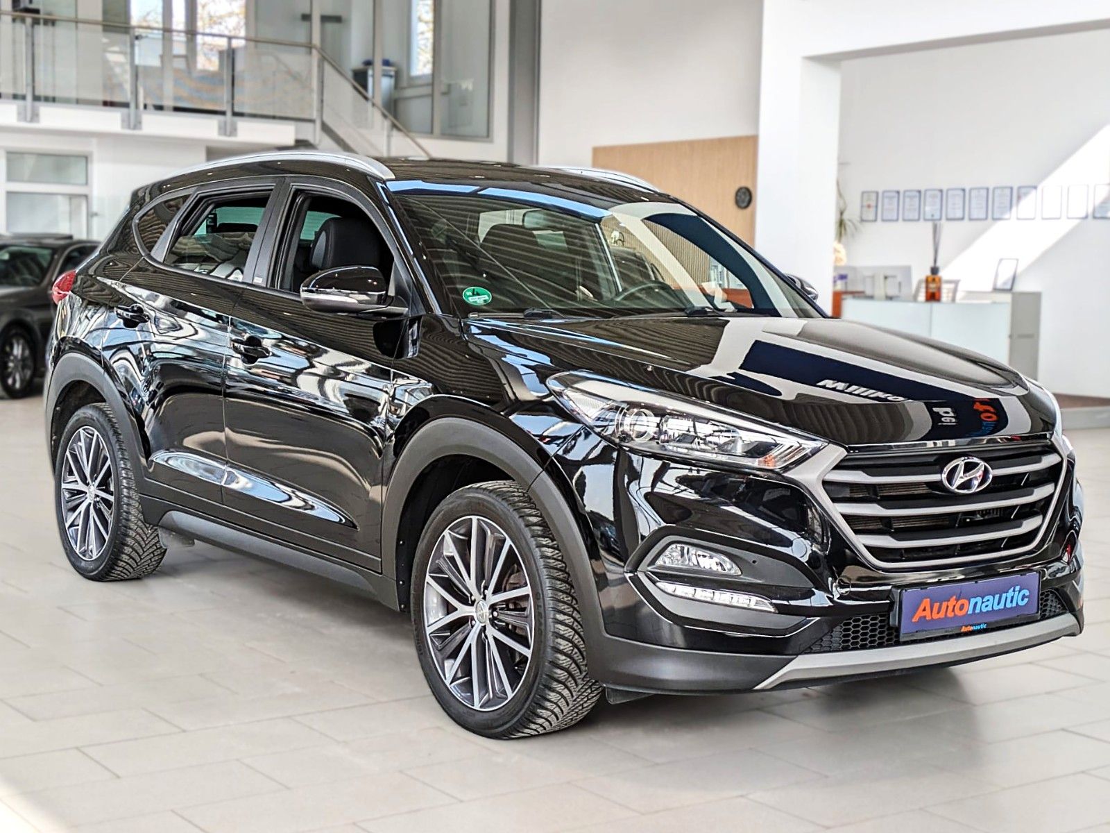 Fahrzeugabbildung Hyundai TUCSON 1.6i DTC PASSION SITZHZ ANDROID NAVI CAM