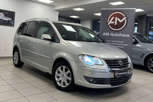 Volkswagen Touran 2.0TDI Highline *Bi-Xenon*Navi*Leder*PDC