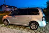 Volkswagen Touran 1.4 TSI DSG Freestyle Freestyle - Volkswagen Touran Freestyle mit Benzin-Antrieb