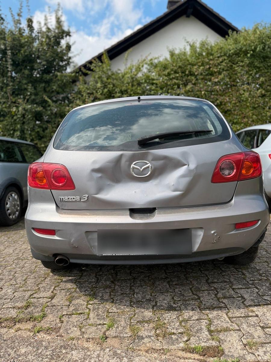 Mazda 3 2004 — engine 105 HP (77kW)