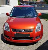 Suzuki Swift 1,3  - Suzuki Swift mit Benzin-Antrieb: Orange, Limousine