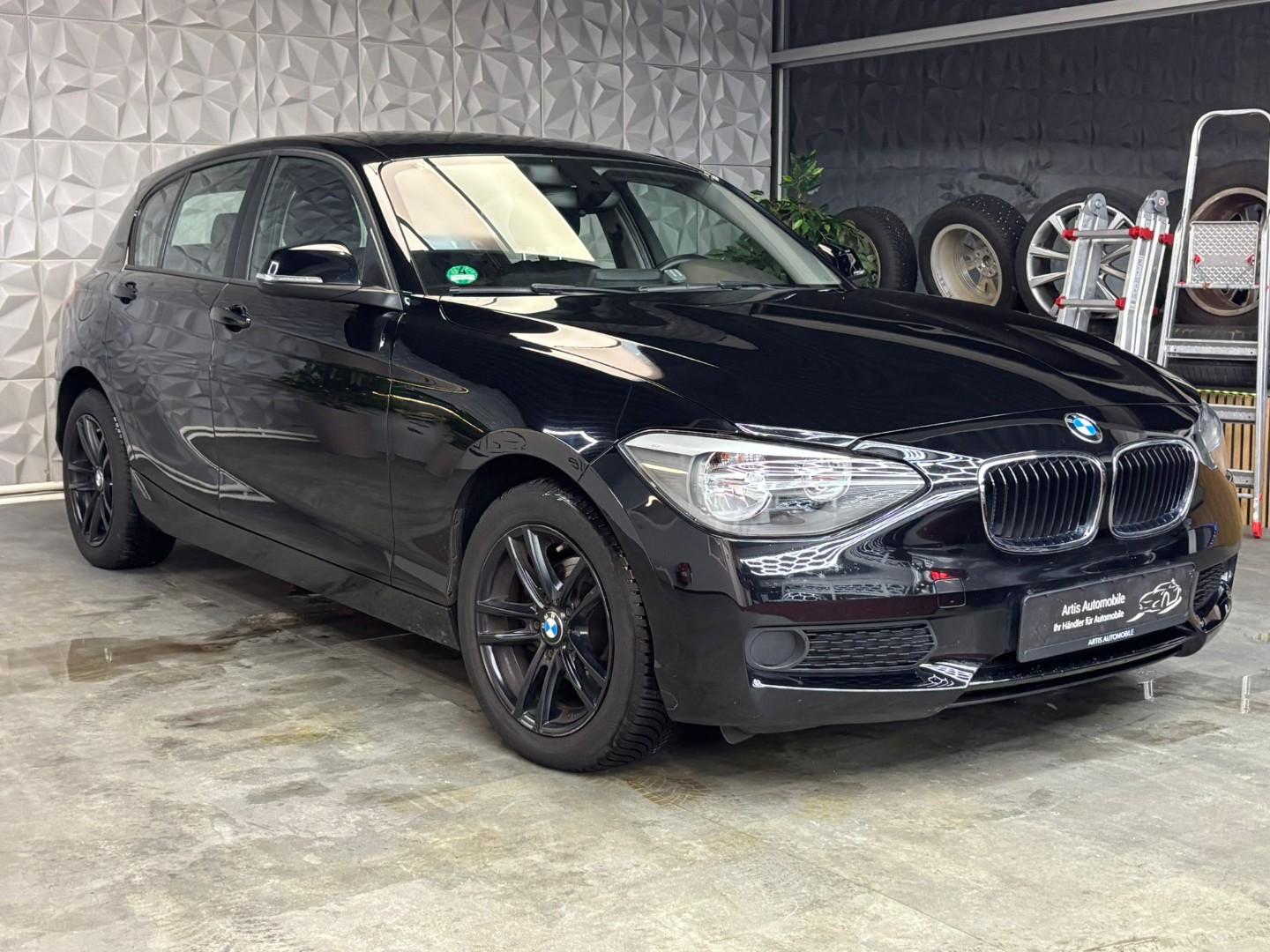 BMW 114 2014 — photo 5