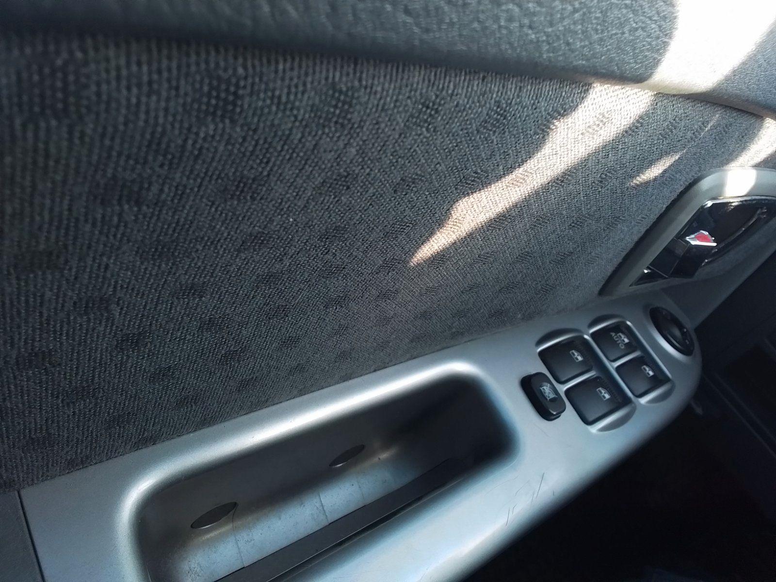 Kia Carens 2006 — photo 10