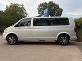 Volkswagen T5 Multivan*4Motion*LANG*9SITZER*NAVI*1HAND*XENO - Volkswagen T5 mit Diesel-Antrieb