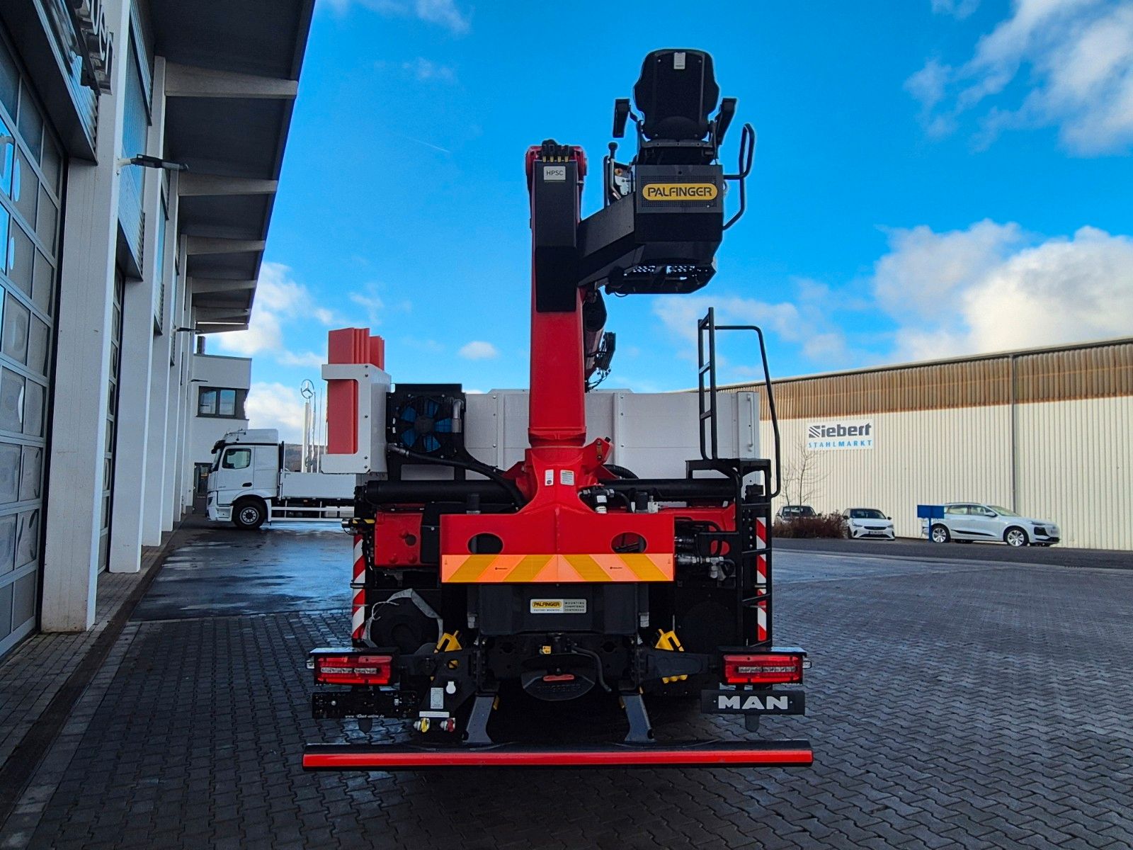 Fahrzeugabbildung MAN TGS 26.470 6x2-4 LL Baustoff Palfinger PK20.501L