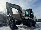 Terex TW85 Mobilbagger - Terex Baggerlader