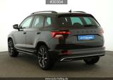 Skoda Karoq 2.0 TSI Sportline 4x4 #AHK#Cam#ACC#DCC#Cam - gebrauchte Skoda Karoq aus dem Jahr 2021
