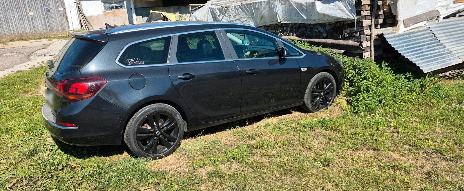 Opel Astra 2014 — photo 15