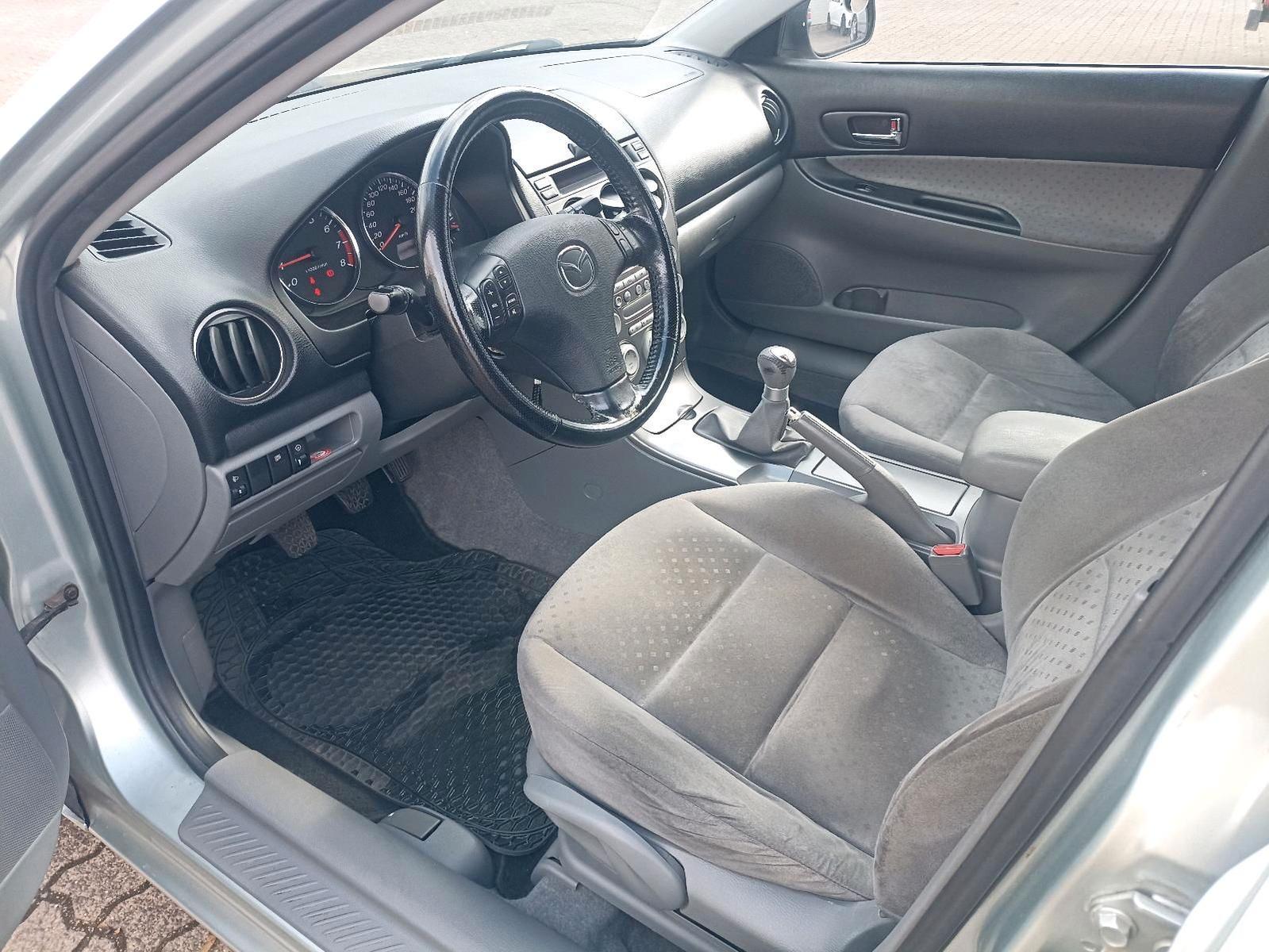 Mazda 2 2004 — photo 7