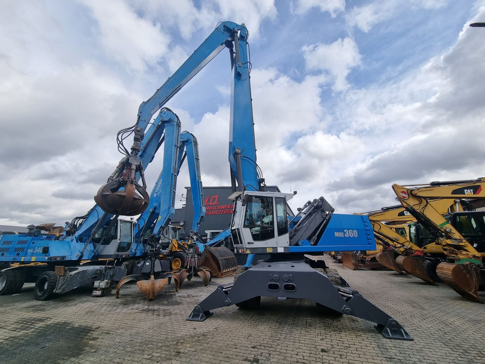 Fahrzeugabbildung Fuchs MHL 360 / AC / Magnetanlage /Polypgreifer /