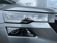 Skoda Karoq 1.5 TSI DSG Sportline PANO KAM AHK 4JGAR bei Autohaus Landmann & Maier OHG