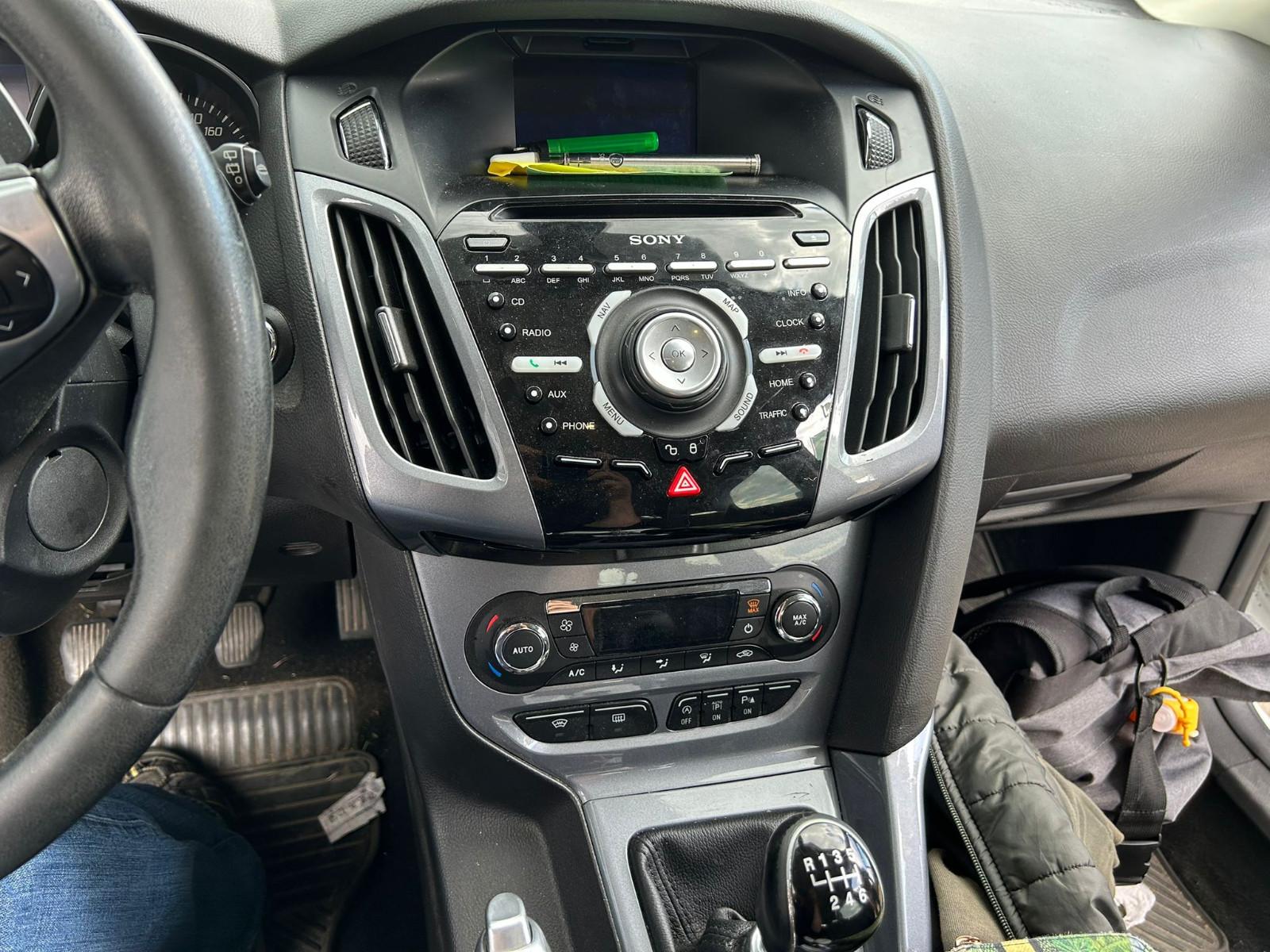 Ford Focus 2014 — engine 1.560 cm³, 95 HP (70kW)