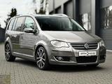 Volkswagen Touran R-Line Schiebedach Leder 7Sitze IHand - gebrauchte VW Touran aus dem Jahr 2009