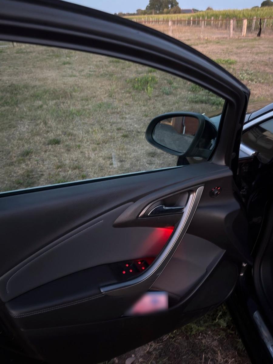 Opel Astra 2014 — photo 7