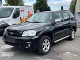 Mazda Tribute 2.3 Exclusive 4X4 - Mazda Tribute
