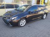 Toyota Corolla Touring Sports Hybrid Business Edition - mit Hybrid-Antrieb: Braun, Kombi