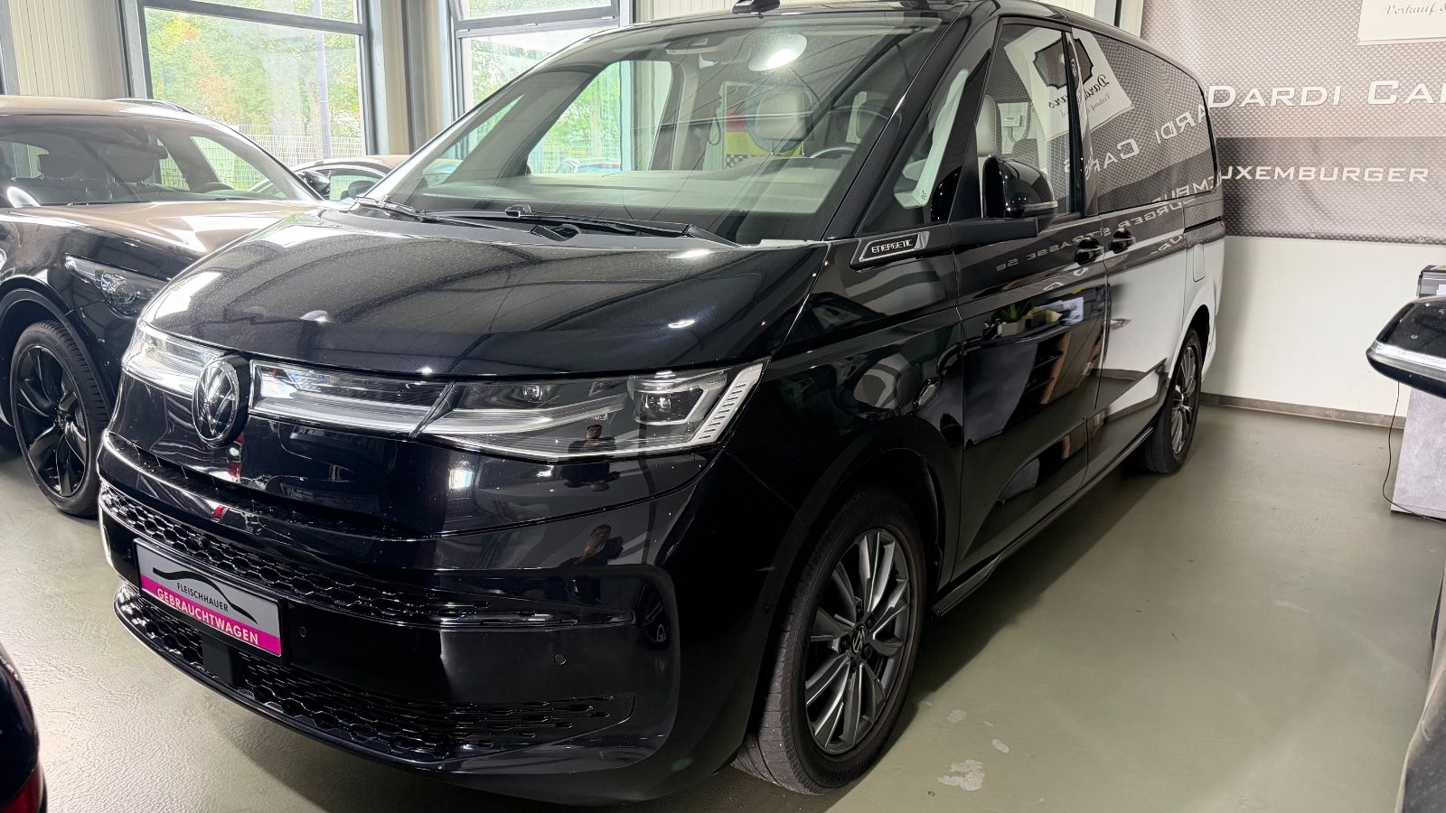Volkswagen T7 Multivan eHybrid lang Panorama/7Sitze-Voll! imagem 3
