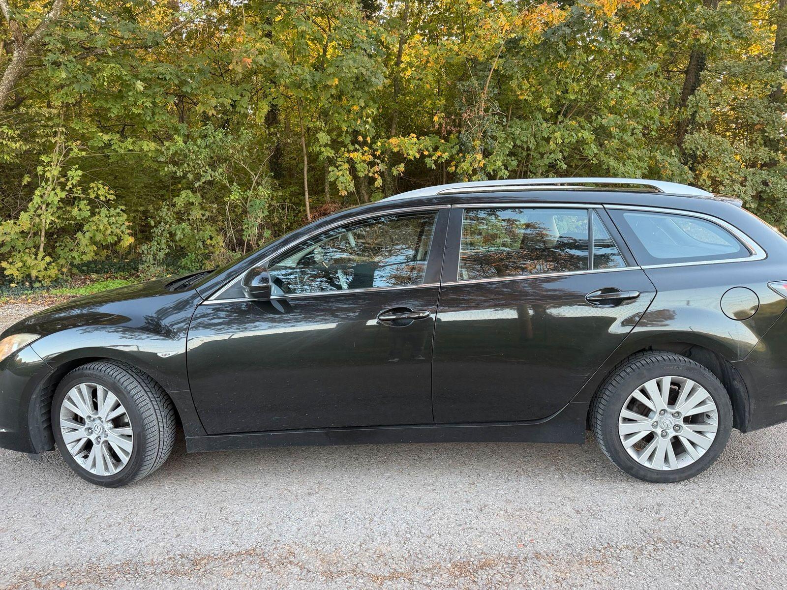 Mazda 2 2009 — photo 9