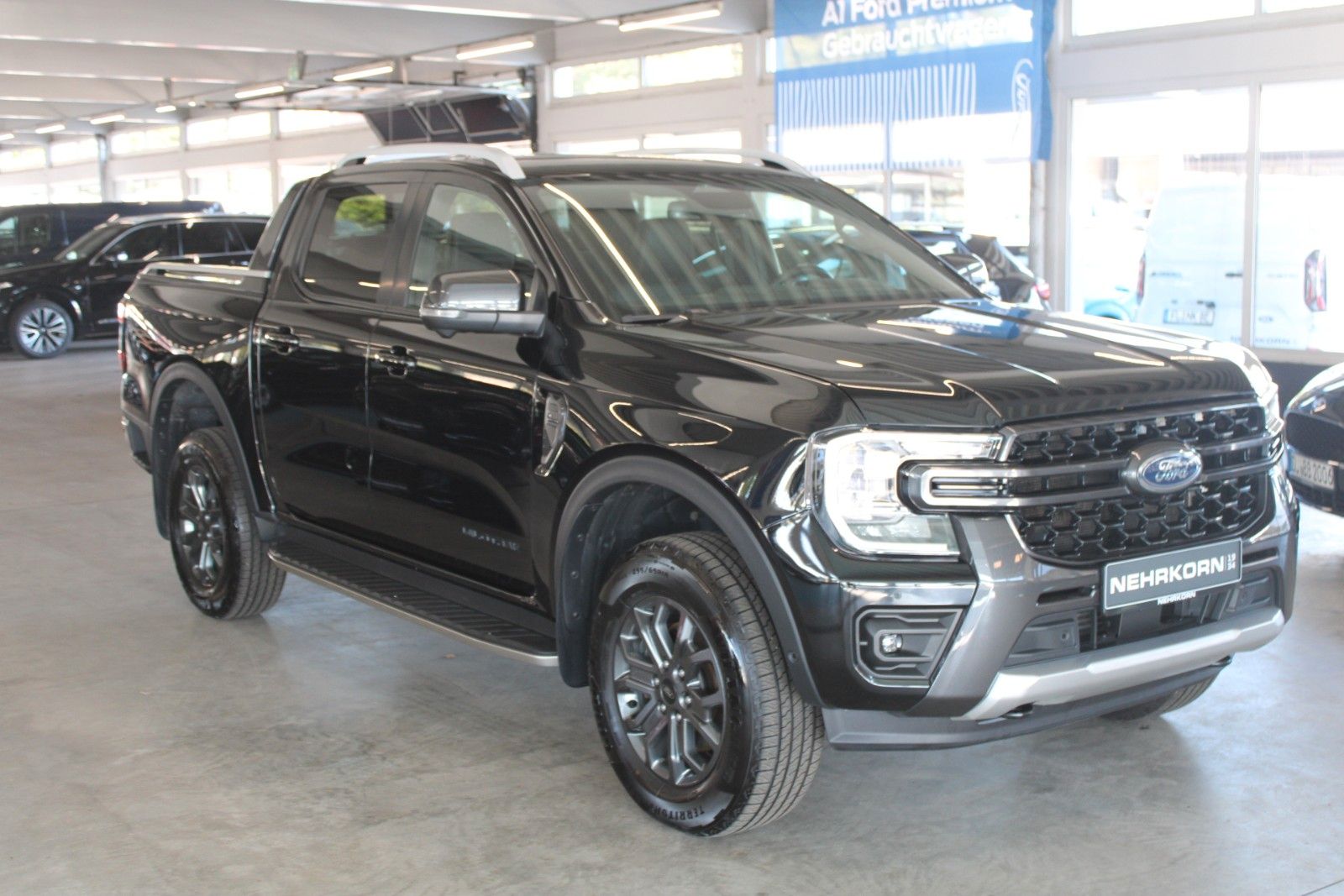 Fahrzeugabbildung Ford Ranger Wildtrak Automatik AHK Leder ACC STDHZ
