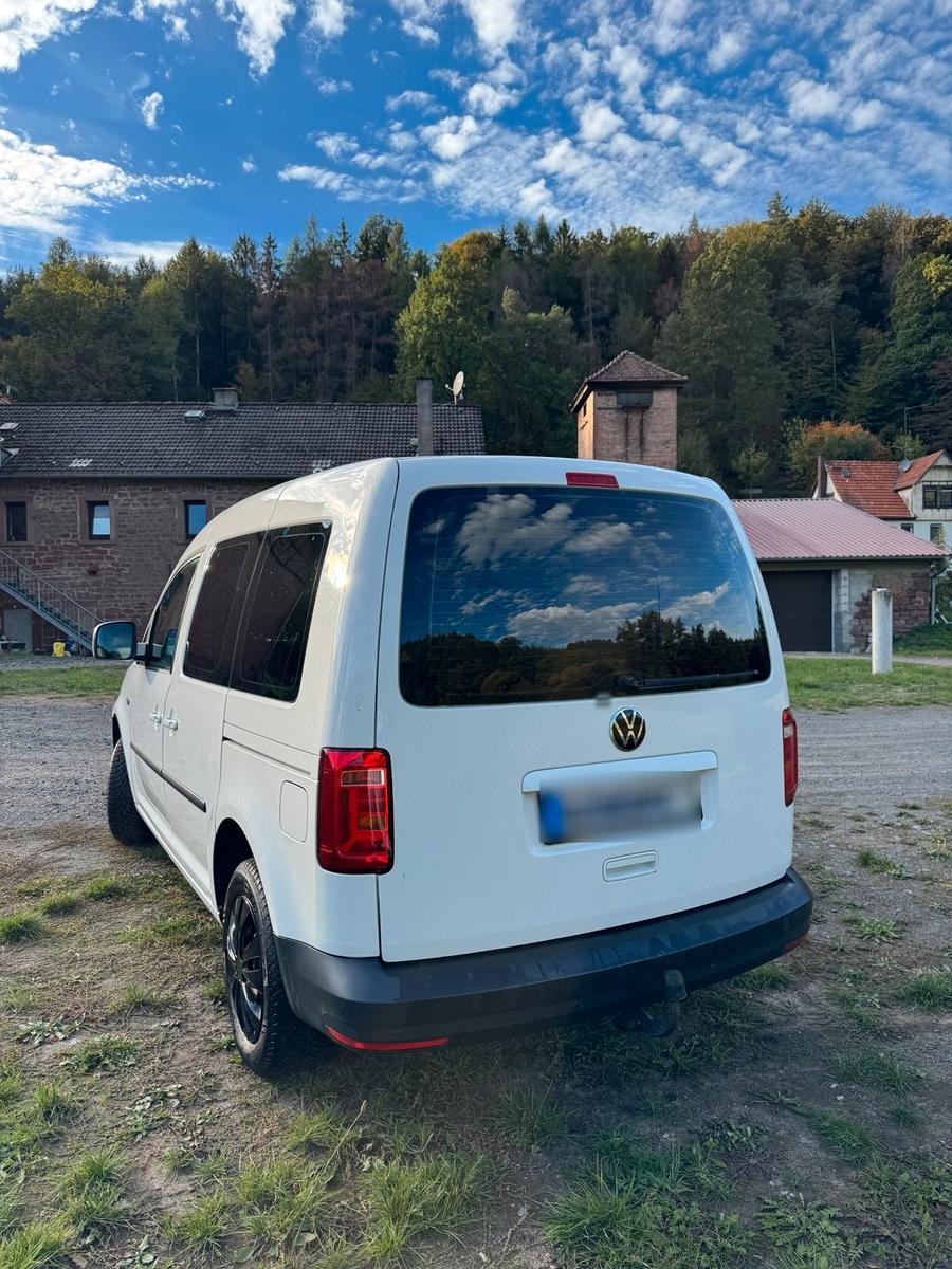 Volkswagen Caddy 2011 — engine 102 HP (75kW)