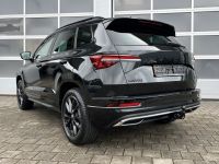 Skoda Karoq 2.0 TSI DSG 4x4 Sportline AHK PANO 5J GAR bei Autohaus Landmann & Maier OHG