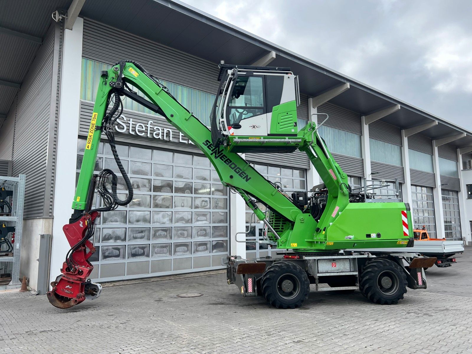 Fahrzeugabbildung Sennebogen 718 / inkl. Vosch Fällzange / nur 1.965h!