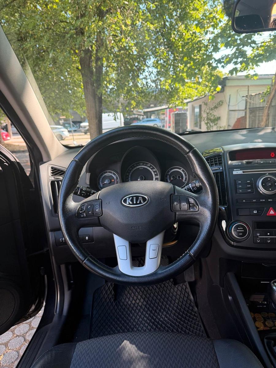 Kia cee'd 2010 — photo 10