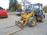CAT 906 H 2 Radlder mit Schaufel + Gabel 1. Hand - Angebote