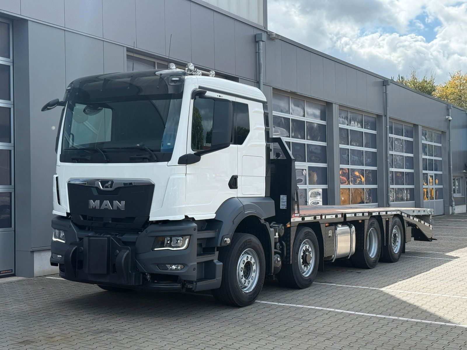 Fahrzeugabbildung MAN TGS 35.520 8x2H Maschinentransporter Funk* Seil*
