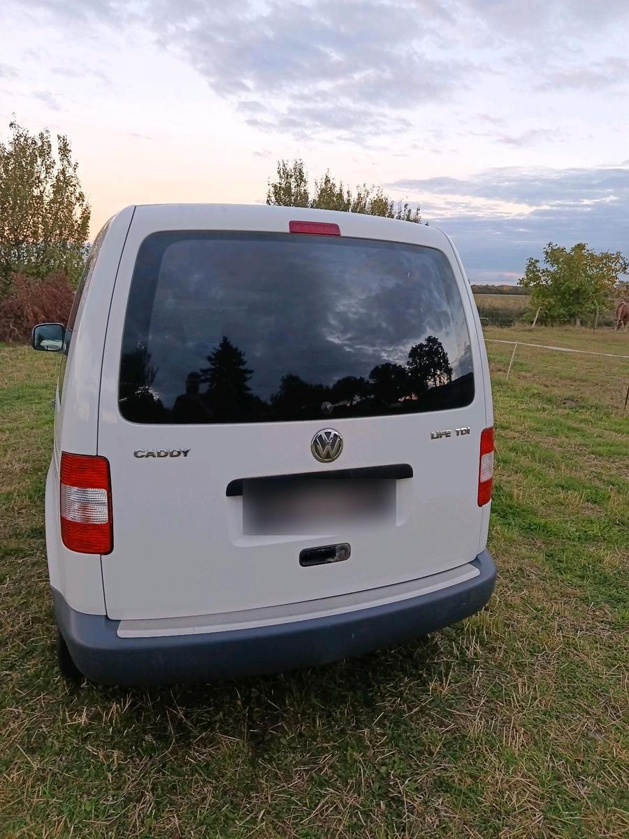 Volkswagen Caddy 2006 — engine 105 HP (77kW)