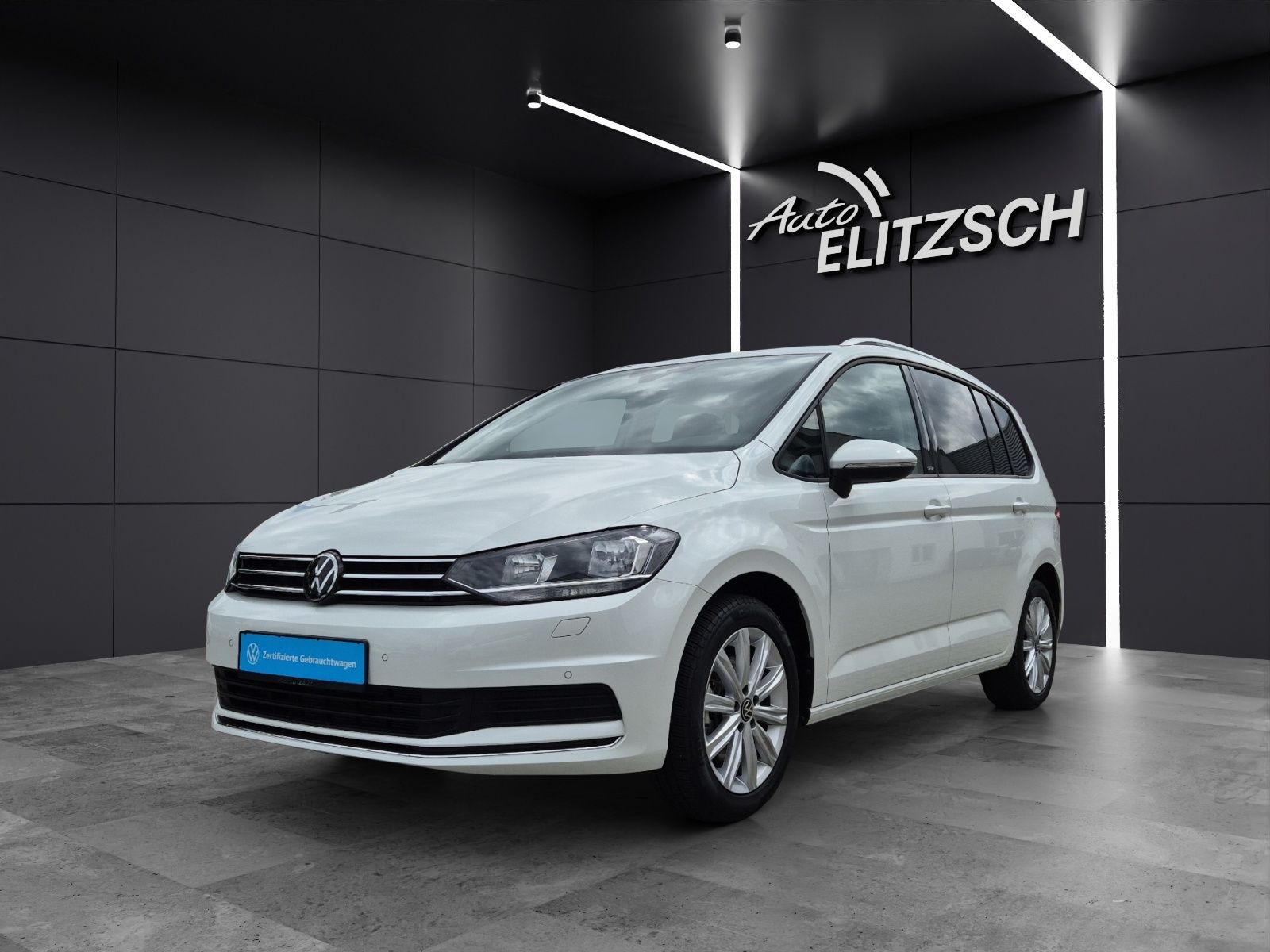 Fahrzeugabbildung Volkswagen Touran TSI Move 7-Si AHK Navi AID ACC PDC SH LM
