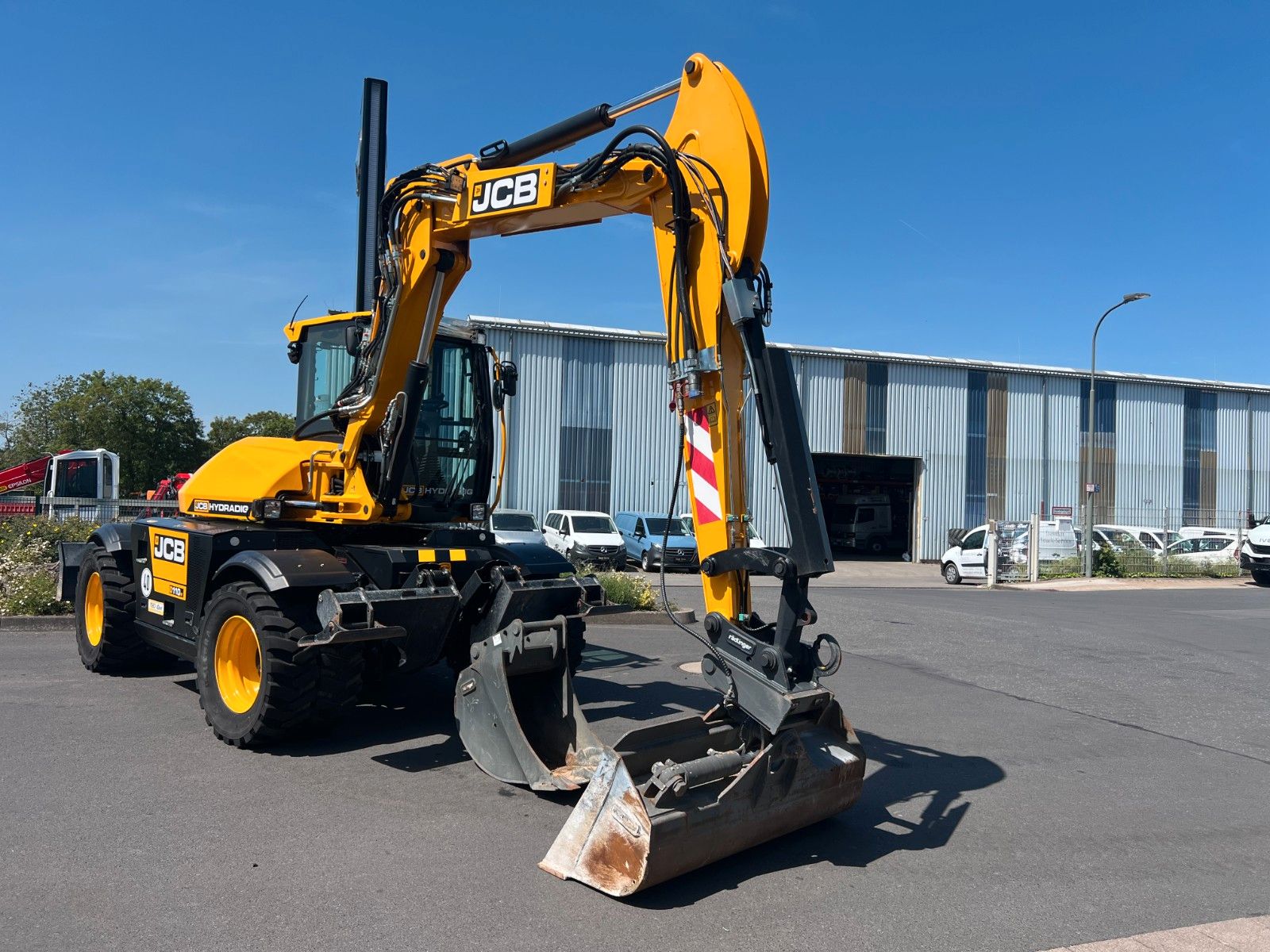 Fahrzeugabbildung JCB Hydradig 110W / Pratzen / nur 179h / Löffelpaket