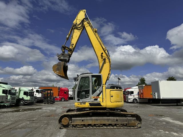 New Holland Kobelco E 235BSR-2 *OilQuick 2xLöffel*24800kg