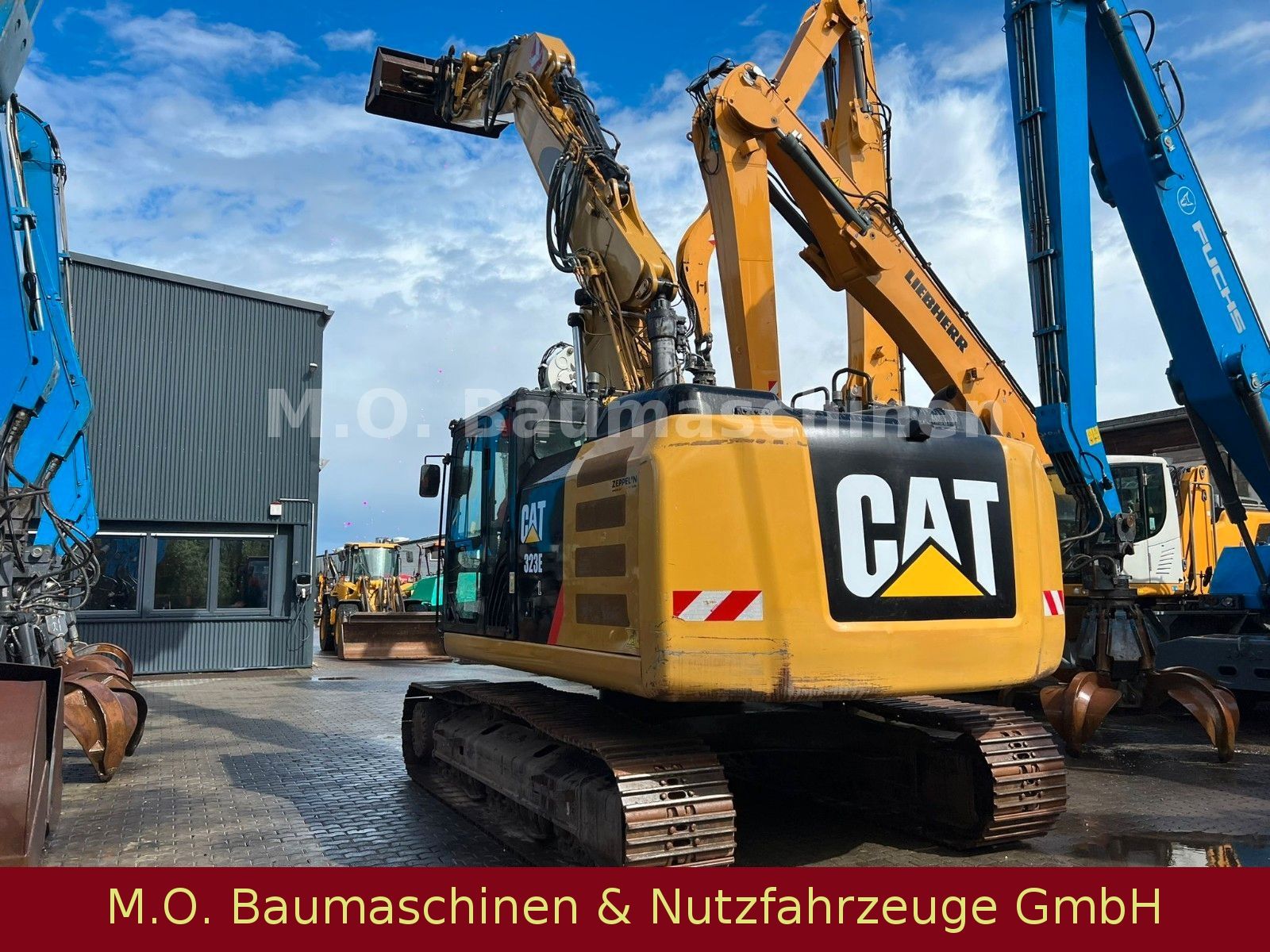 Fahrzeugabbildung CAT 323 EL /Trimble 3 D  VSA / Oilquick OQ 70/55