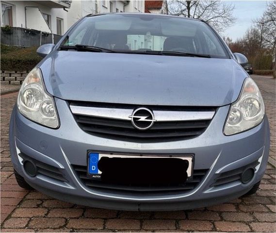 Opel Zum Verkauf steht ein blauer Opel Corsa au...