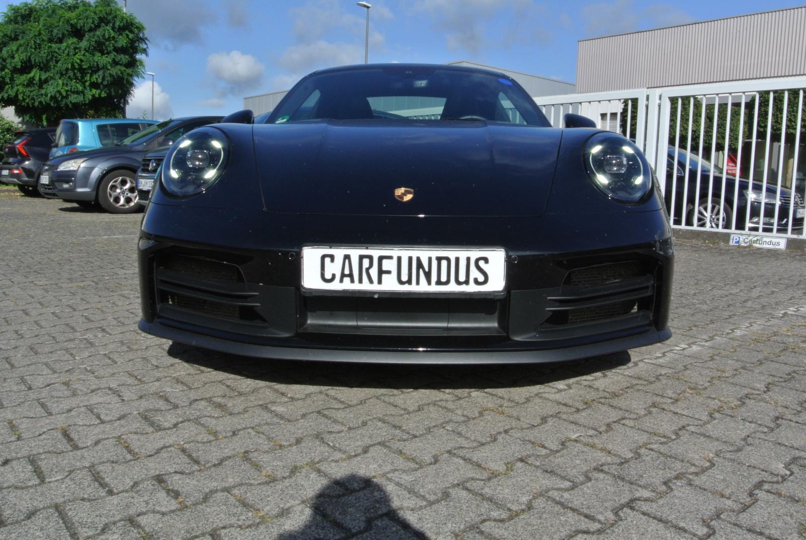Porsche 992 coupe,schw/schw,21",abgas,essd,kamera,bose