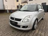 Suzuki Swift Lim. Club - silberne Suzuki Swift