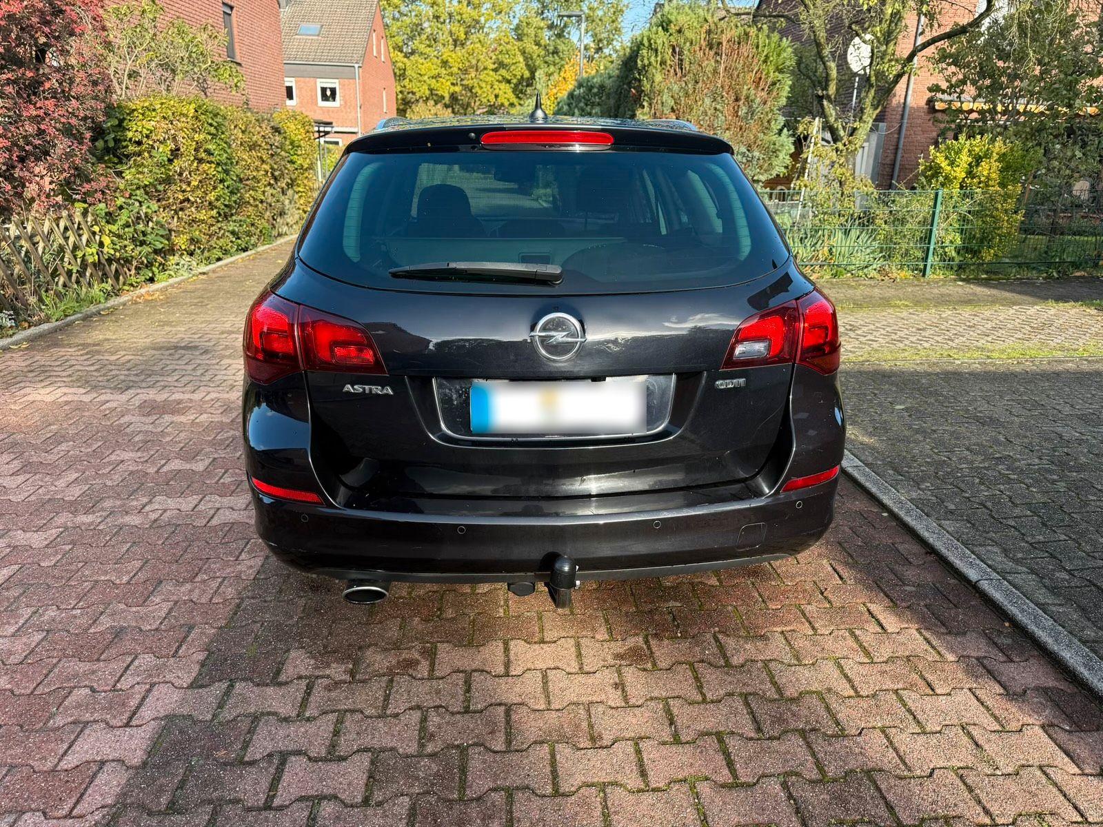 Opel Astra 2011 — engine 160 HP (118kW)