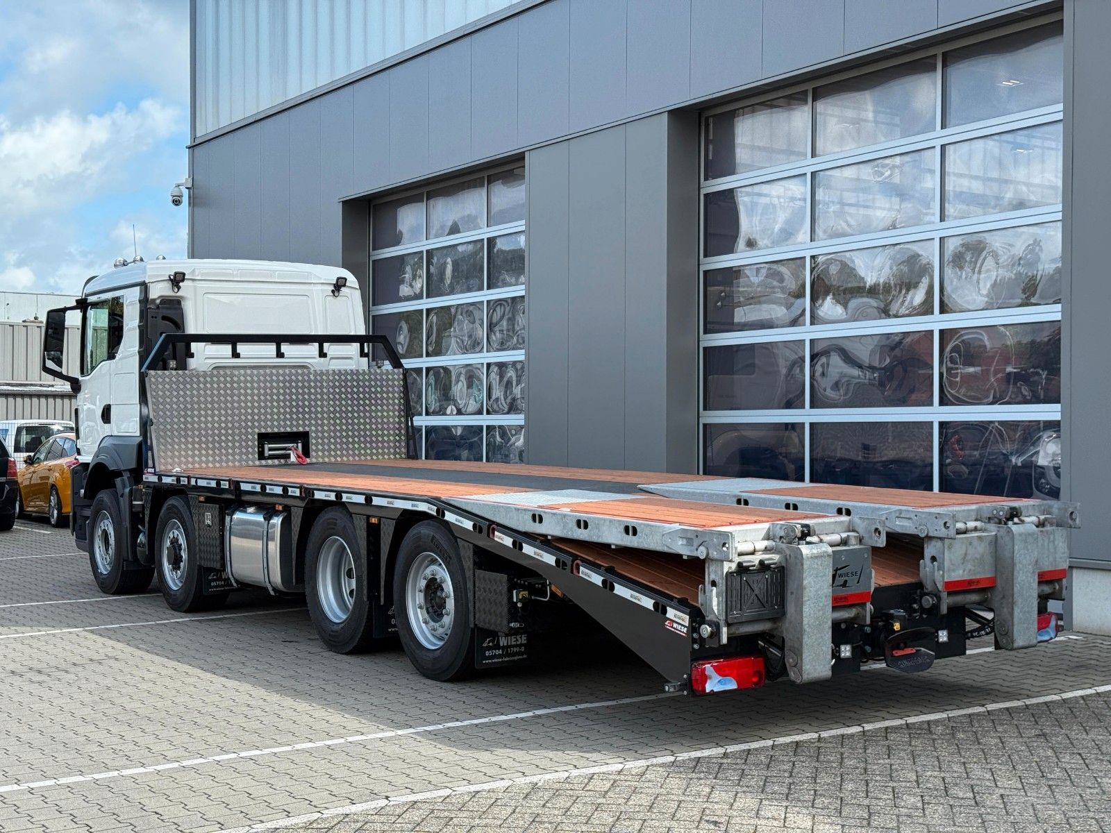 Fahrzeugabbildung MAN TGS 35.520 8x2H Maschinentransporter Funk* Seil*