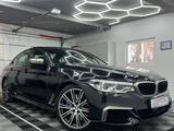 BMW M550 d xDrive/LASER/ACC/DAB/H&K/DRIV. ASS. PLUS - BMW M550 mit Diesel-Antrieb: Limousine