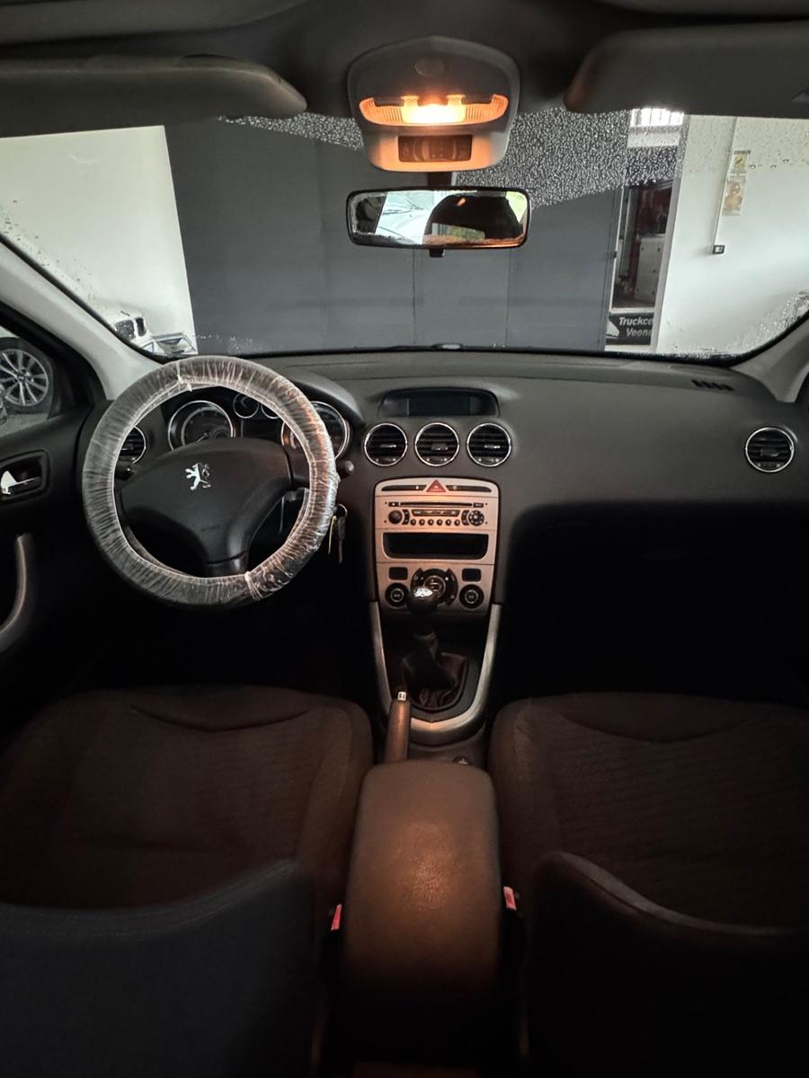 Peugeot 308 2009 — photo 9