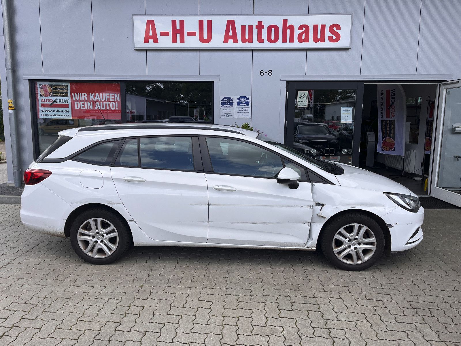 Fahrzeugabbildung Opel Astra K Sports Tourer Edition Seitenschaden