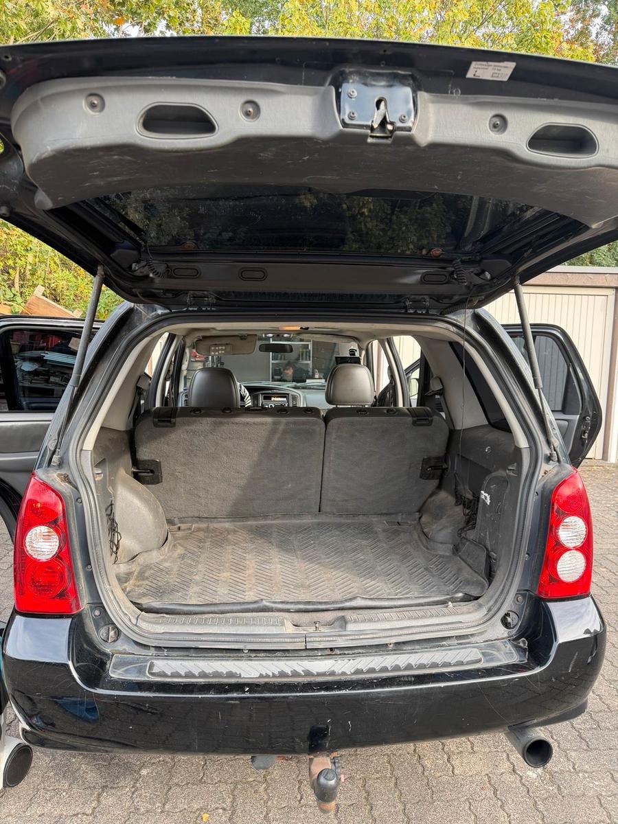 Mazda Tribute 2004 — photo 8