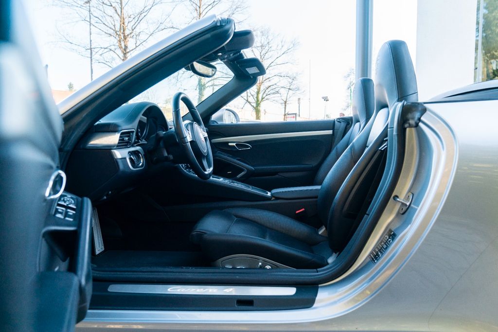 PORSCHE 991 Carrera 4 Cabriolet/ PASM / SPORT AGA / BOSE PORSCHE 991 Carrera 4 Cabriolet/ PASM / SPORT AGA / BOSE